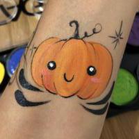 Halloween Pumpkin arm paint - Olivian Face Paint
