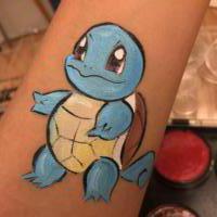 Pokermon arm paint - Olivian Face Paint