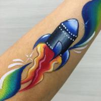 Rocket arm paint - Olivian Face Paint